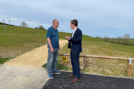 Tom and a resident discussing an issue at the Diamond Heights development, Irthlingborough