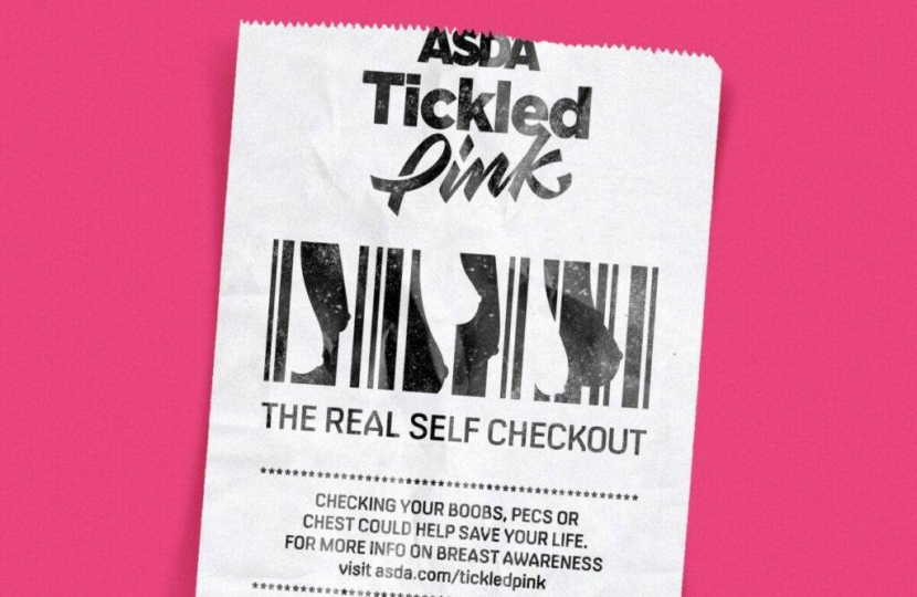 Poster of an 'Asda Tickled Pink' receipt which reads 'The real self check-out' 'Checking your boobs, pecs or chest could help save your life.' 'For more information on breast awareness, visit: asda.com/tickledpink'