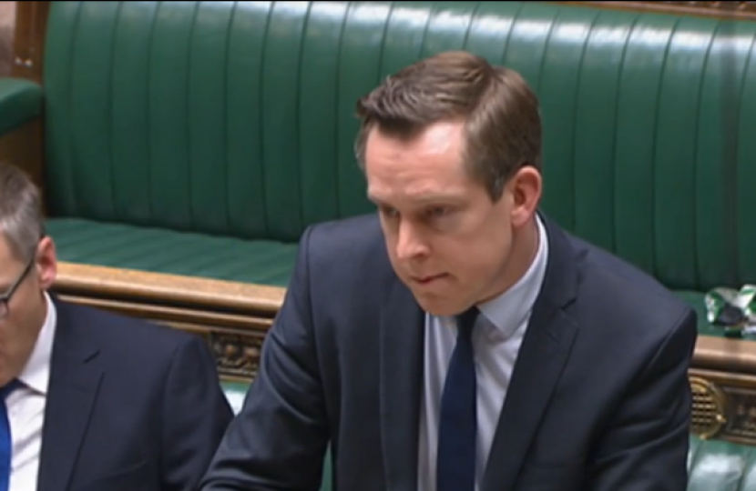 Tom Pursglove MP in his role as Minister for Legal Migration and the Border answering a question in the House during the opposition day debate 