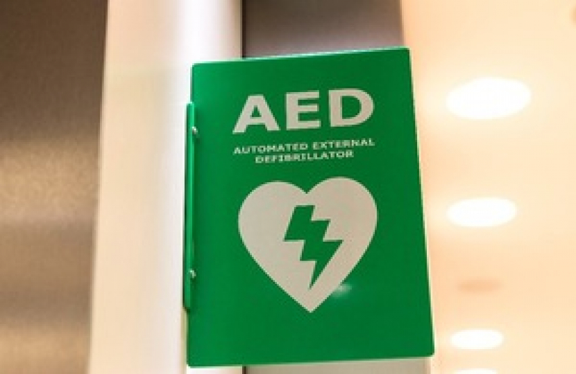 Close up image of a green defibrillator sign