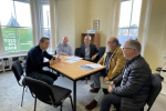 Tom in discussion with councillors, campaigners and the developers of Kettering Energy Park in his constituency office.