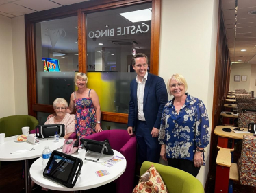 Tom stood with customers at Castle Bingo in Corby