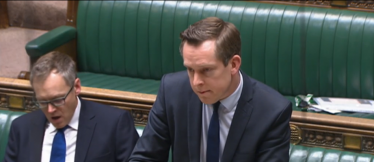 Tom Pursglove MP in his role as Minister for Legal Migration and the Border answering a question in the House during the opposition day debate 